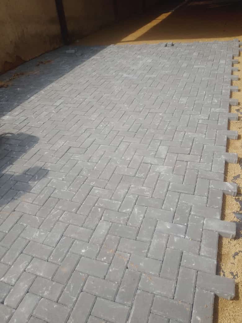 Grey interlocking paving